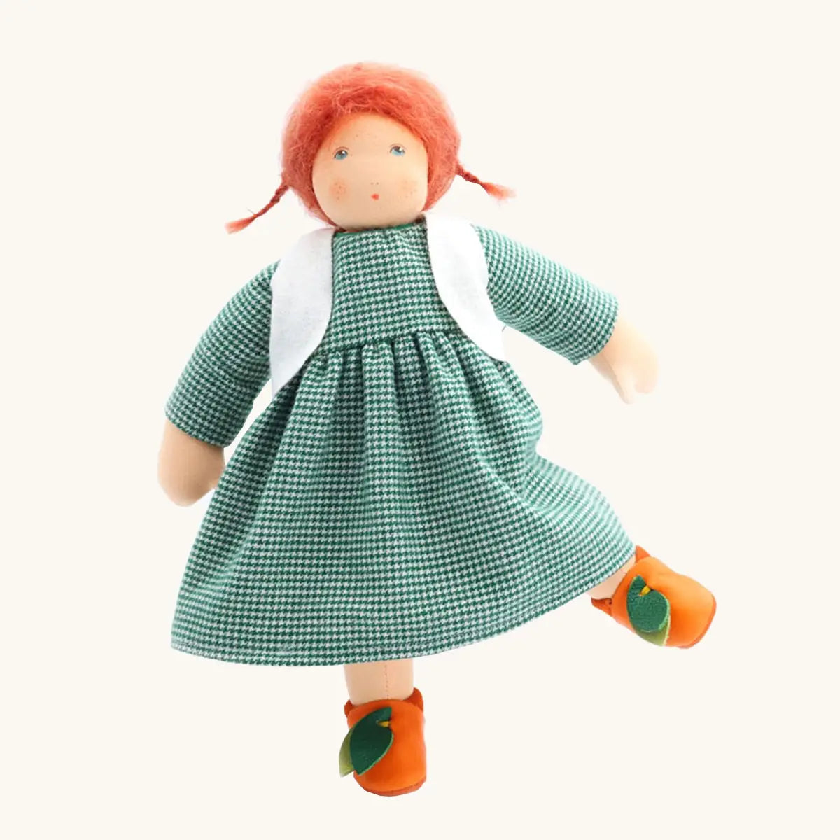 Nanchen Charlotte orange friends doll with a Waldorf style face, red hair. Showing removable white waistcoat, green dress and orange shoes