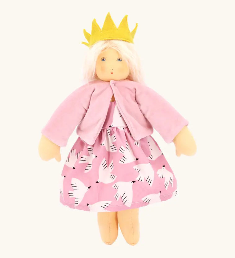 Nanchen soft rosi doll with a  waldorf style face. Showing a removable pink cardigan, dress and yellow crown.