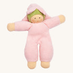 The Nanchen Flower Fairy Rattle Doll as a soft Pink terry material body, with a pretty pink terry material hat in the shape of a flower, and a green terry strip of fabric just under the hat