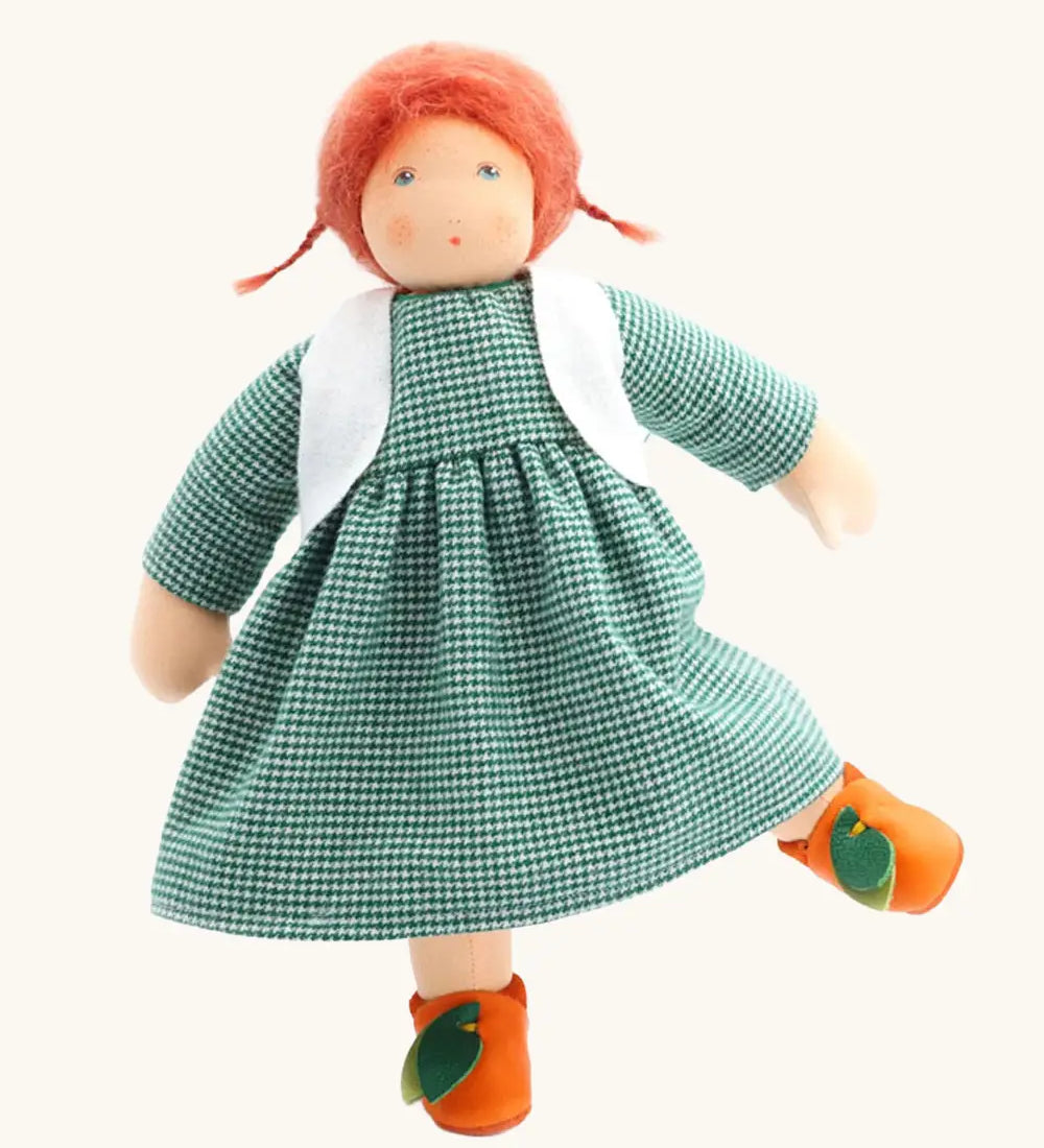 Nanchen Charlotte orange friends doll with a Waldorf style face, red hair. Showing removable white waistcoat, green dress and orange shoes