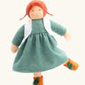 Nanchen Charlotte orange friends doll with a Waldorf style face, red hair. Showing removable white waistcoat, green dress and orange shoes