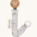 Avery Row Pacifier Holder - Nature Trail, showing the silicone ring and wooden clip