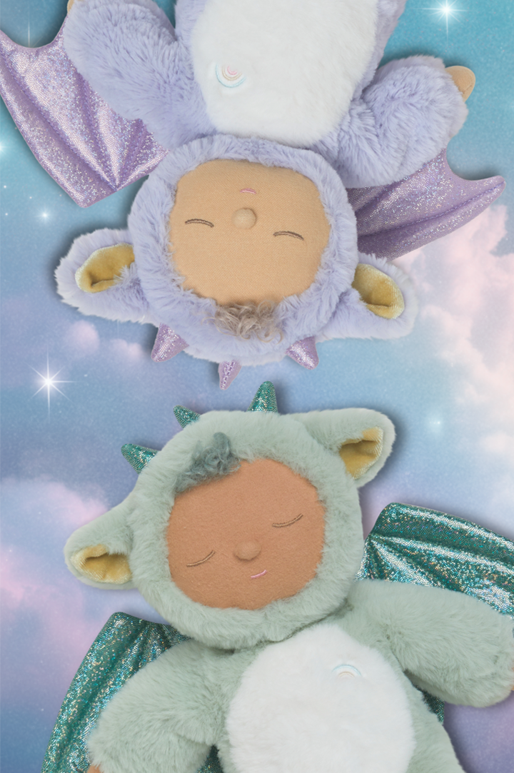 Olli Ella Cozy Dinkum Dragons Rory and Ash, fluffy soft toy babies with sparkly dragon wings in green and purple, to represent new Olli Ella at Babipur.