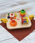 Nic Wooden Baby Game busy Board with 4 four activities. Spin the carousel, squeaky button, rattling tree top and roller.