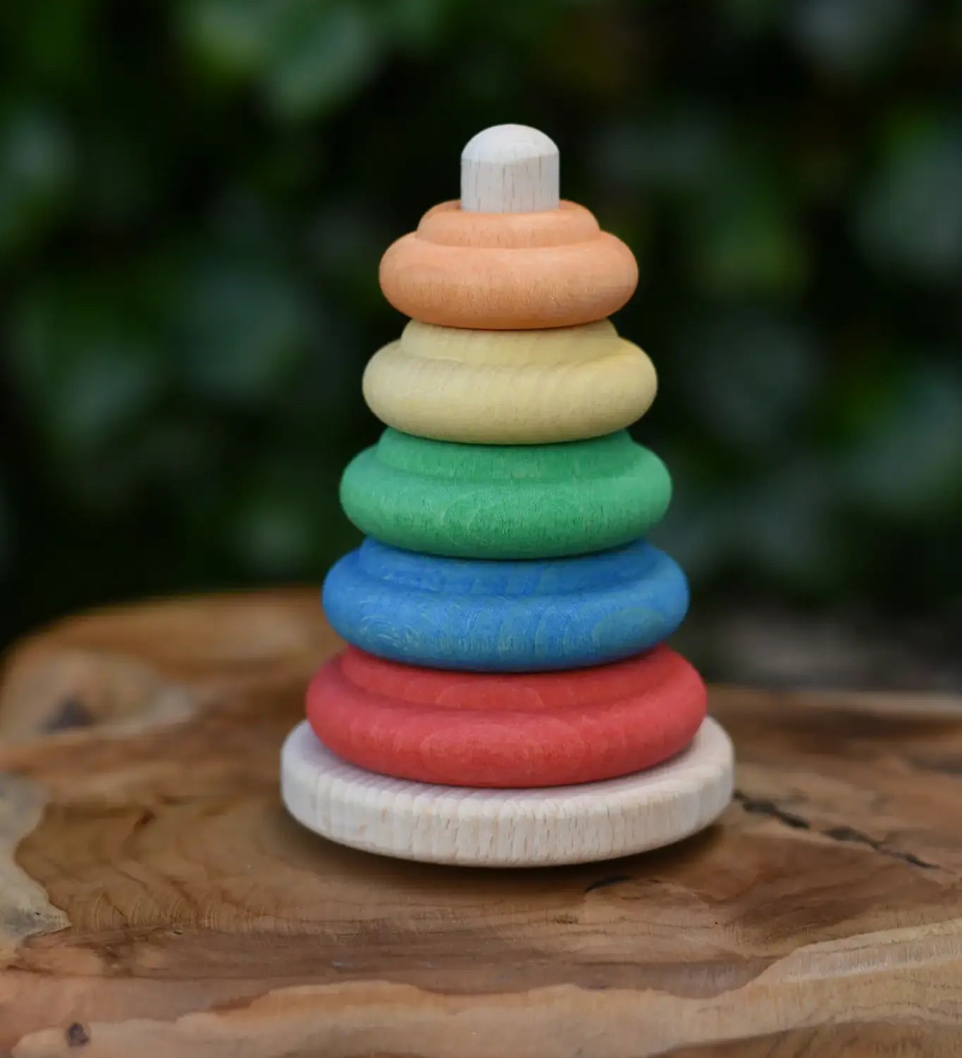 Nic Classic Stacking Tower placed on a wooden board.