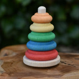 Nic Classic Stacking Tower placed on a wooden board.