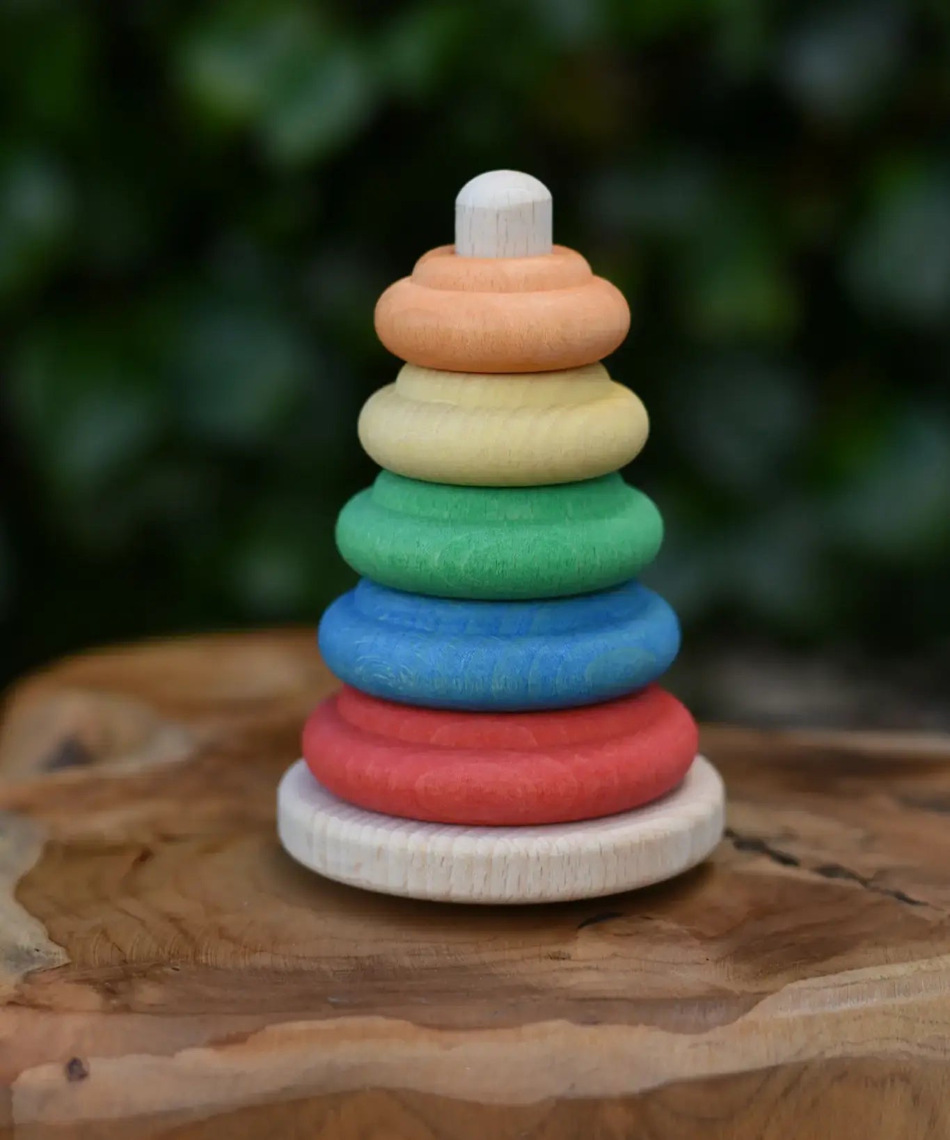 Nic Classic Stacking Tower placed on a wooden board.