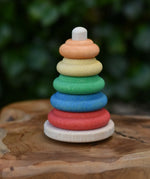 Nic Classic Stacking Tower placed on a wooden board.