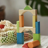 Tower created using blocks from the Glückskäfer wooden Bio Geometric Building Blocks 58 Piece Set.