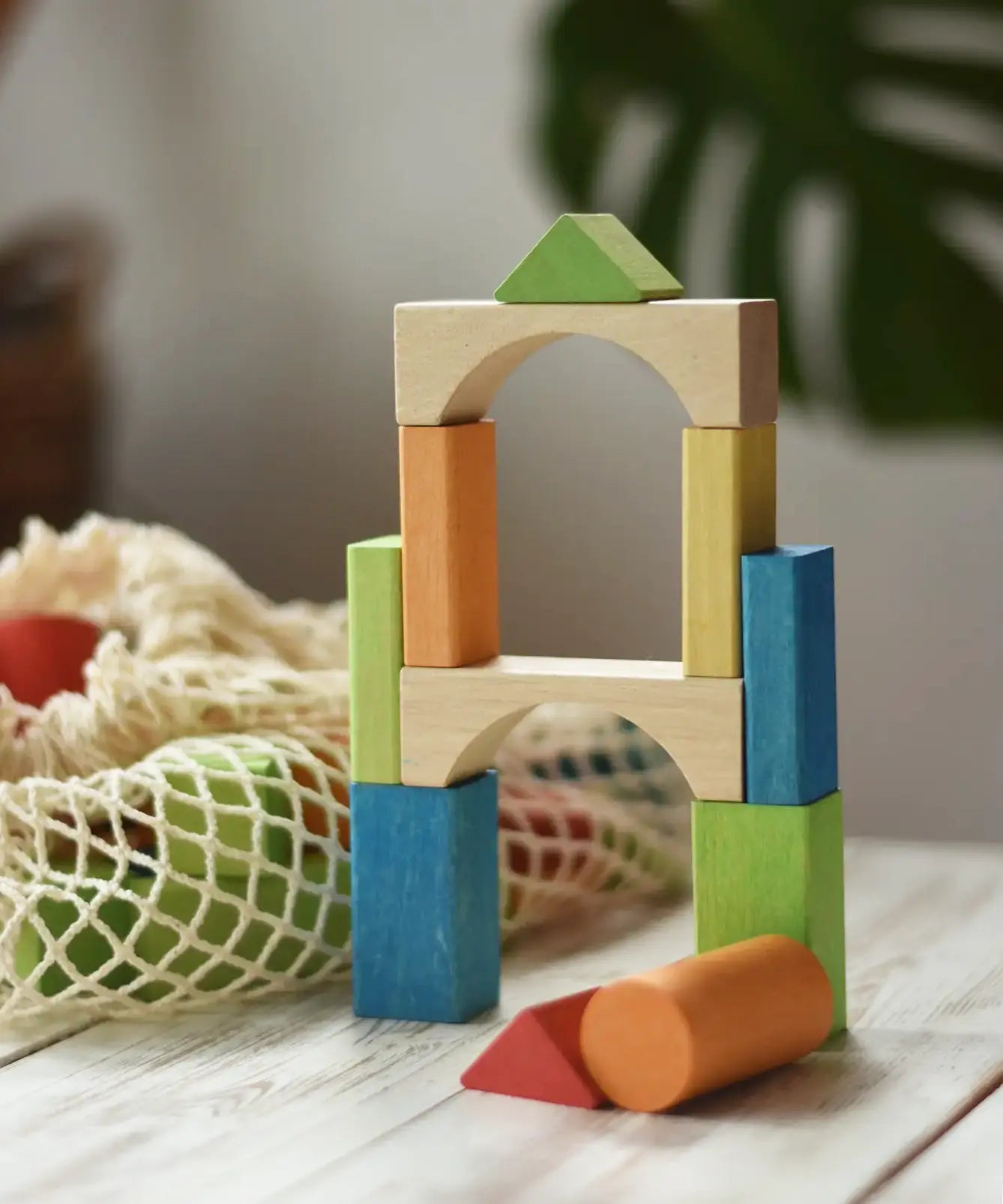 Tower created using blocks from the Glückskäfer wooden Bio Geometric Building Blocks 58 Piece Set.
