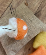 Gluckskafer felt toadstools in the process of being made using Nic Toys felting needles.