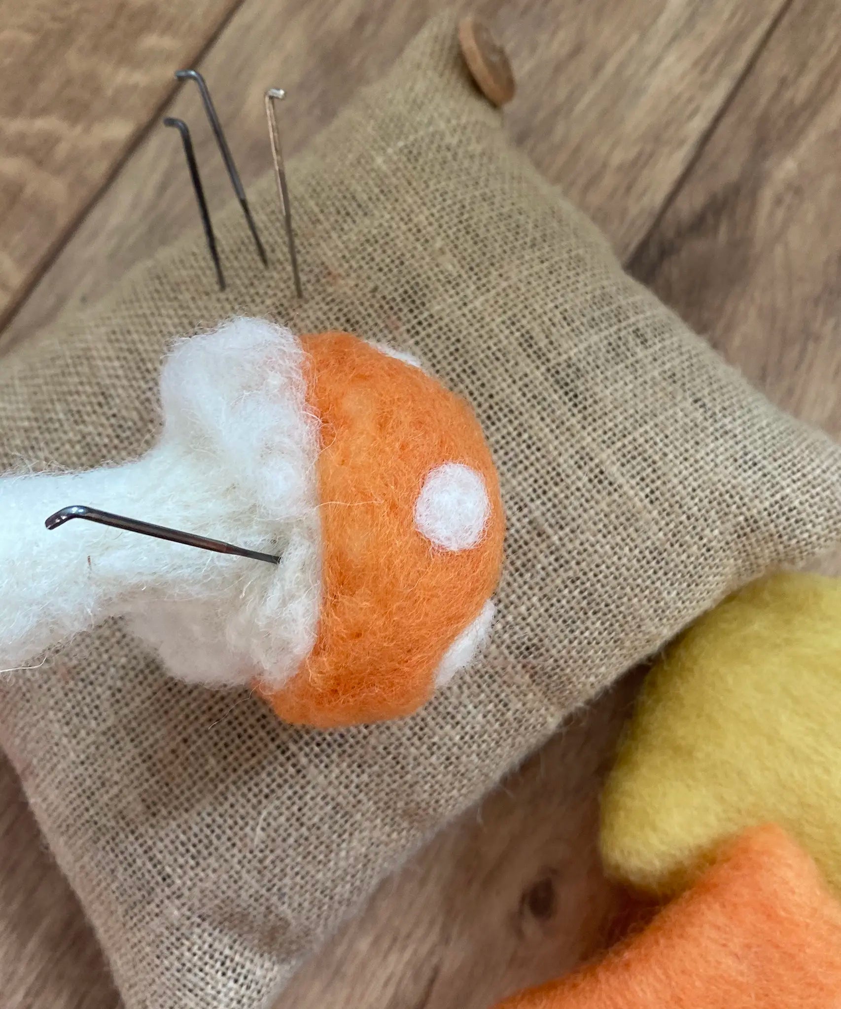 Gluckskafer felt toadstools in the process of being made using Nic Toys felting needles.