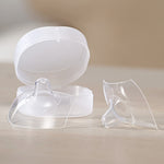The Haakaa Silicone Nipple Shields with their storage case in the background