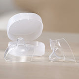 The Haakaa Silicone Nipple Shields with their storage case in the background