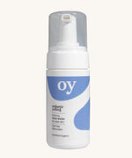 The Oy foaming face wash for clean skin, with tea tree and willow bark, on a cream background