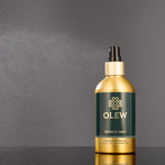 An image of the spray mist coming from the Curl Refresh Mist Bottle.