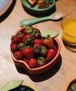 Apple Kids and Baby Wooden bowl filled with strawberries, by Oli and Carol, for sale now at Babipur.