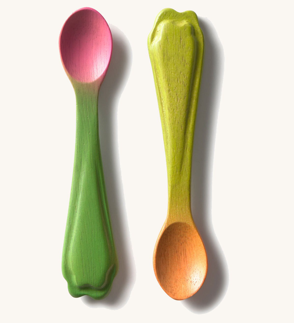 Oli & Carol 2 pack baby wooden spoons in a radish and carrot design . Set is available at Babipur. 