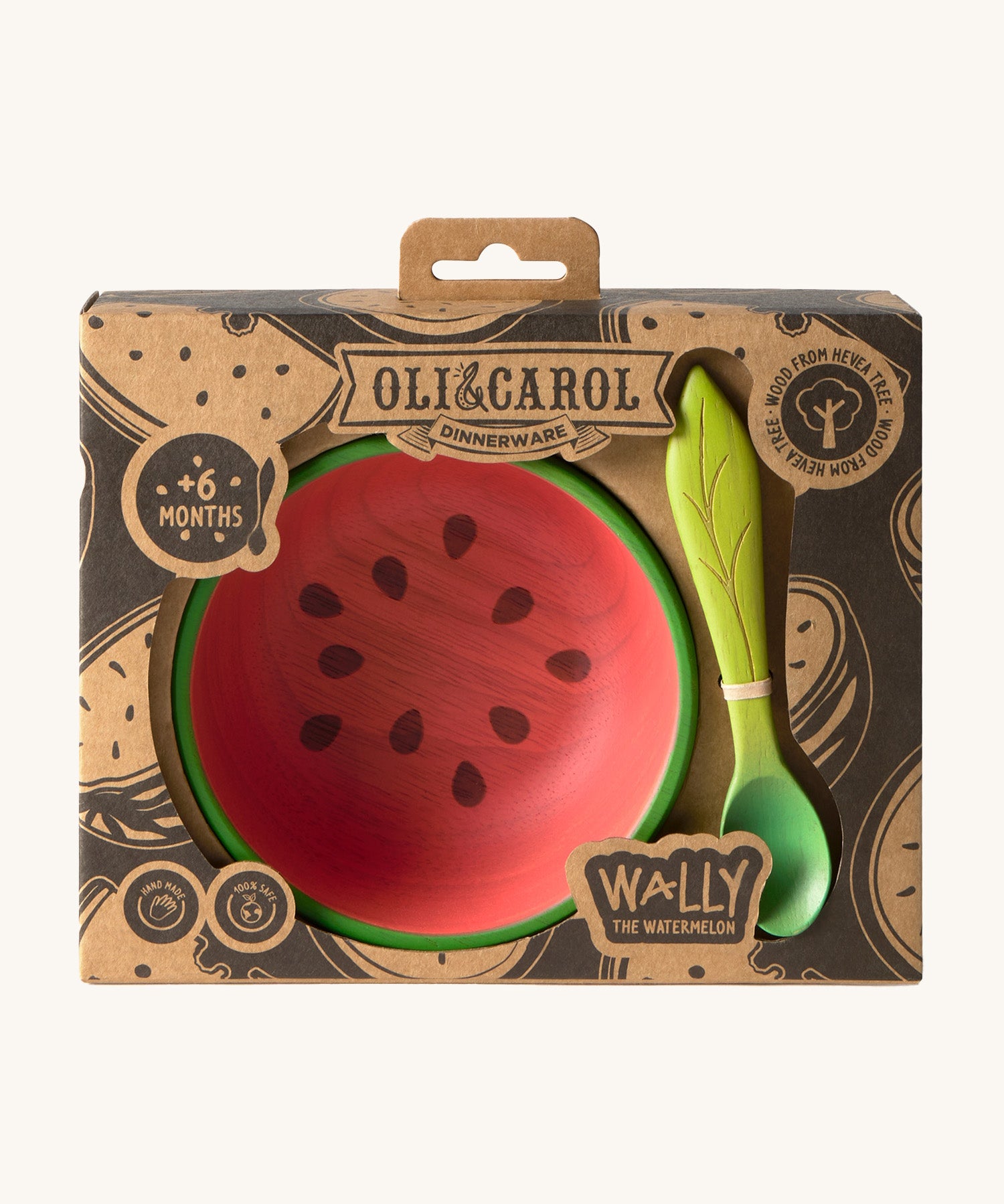 A close up of the cardboard packing holding the Oli & Carol Wally the watermelon wooden bowl and spoon set available at Babipur. 