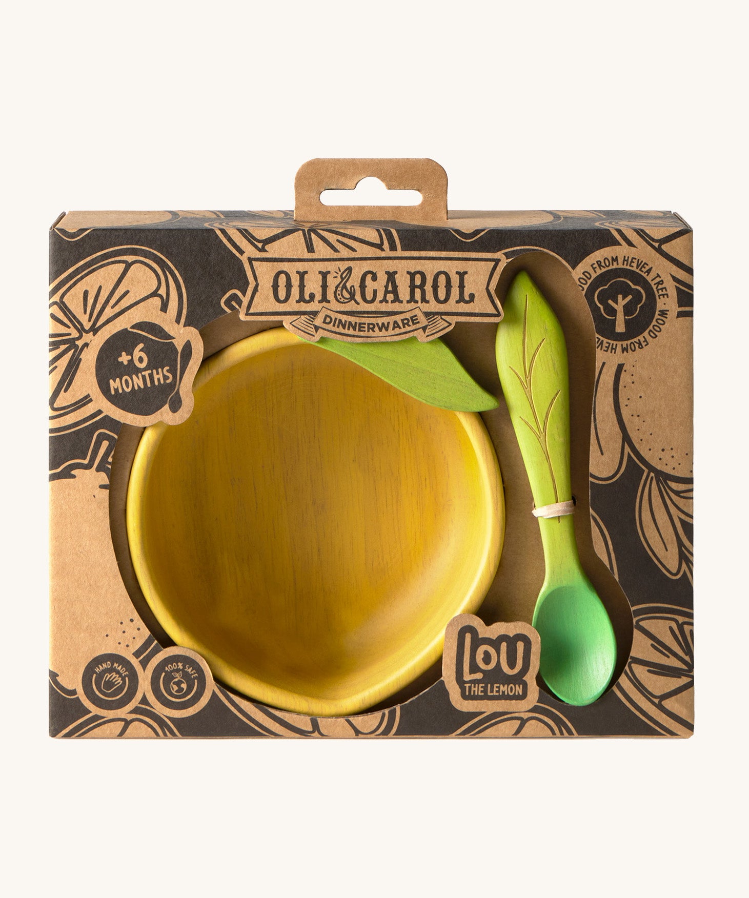 A close up of the cardboard packaging holding the Oli & Carol Lou the lemon wooden bowl and spoon set available at Babipur. 