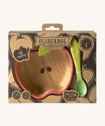 A close up of the cardboard packaging holding the Oli & Carol Peppa the apple wooden bowl and spoon set available at Babipur. 