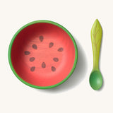Oli & Carol Wally the watermelon wooden bowl and spoon set available at Babipur.  The bowl is in a shape of a watermelon cut in half