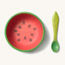 Oli & Carol Wally the watermelon wooden bowl and spoon set available at Babipur.  The bowl is in a shape of a watermelon cut in half