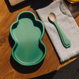 Oli & Carol wooden kale plate and spoon set on a table available at Babipur.