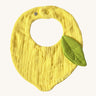 Oli & Carol Lou the lemon baby bib available at Babipur. A organic cotton bib in a shape of a yellow lemon. Features a popper fastener. 
