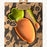 A close up of the cardboard packaging holding the Oli & Carol Cathy the carrot wooden plate and spoon set available at Babipur.