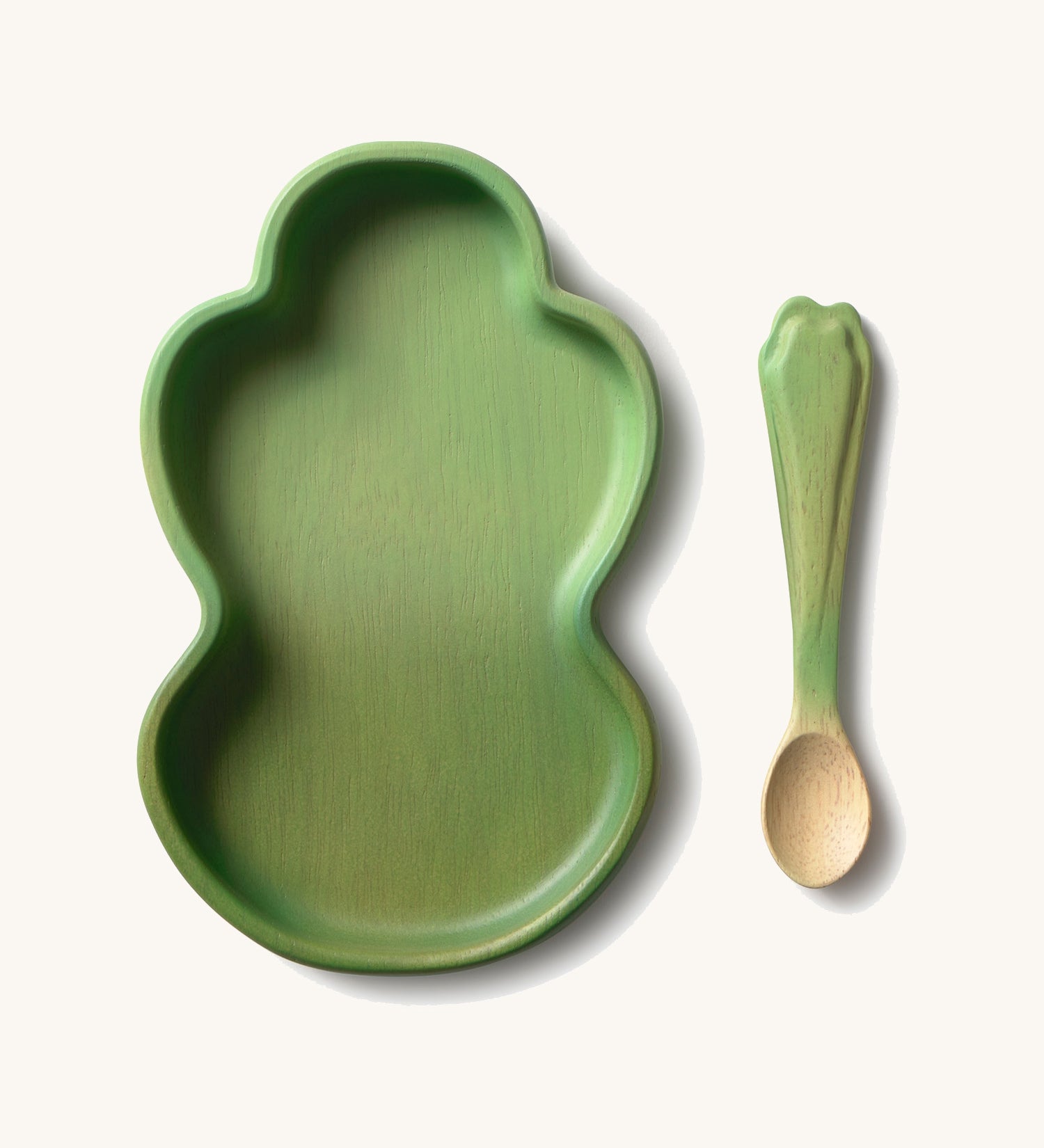 Oli & Carol Kendall the kale wooden plate and spoon set available at Babipur. Plate is in a shape of a piece of kale