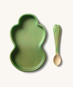 Oli & Carol Kendall the kale wooden plate and spoon set available at Babipur. Plate is in a shape of a piece of kale