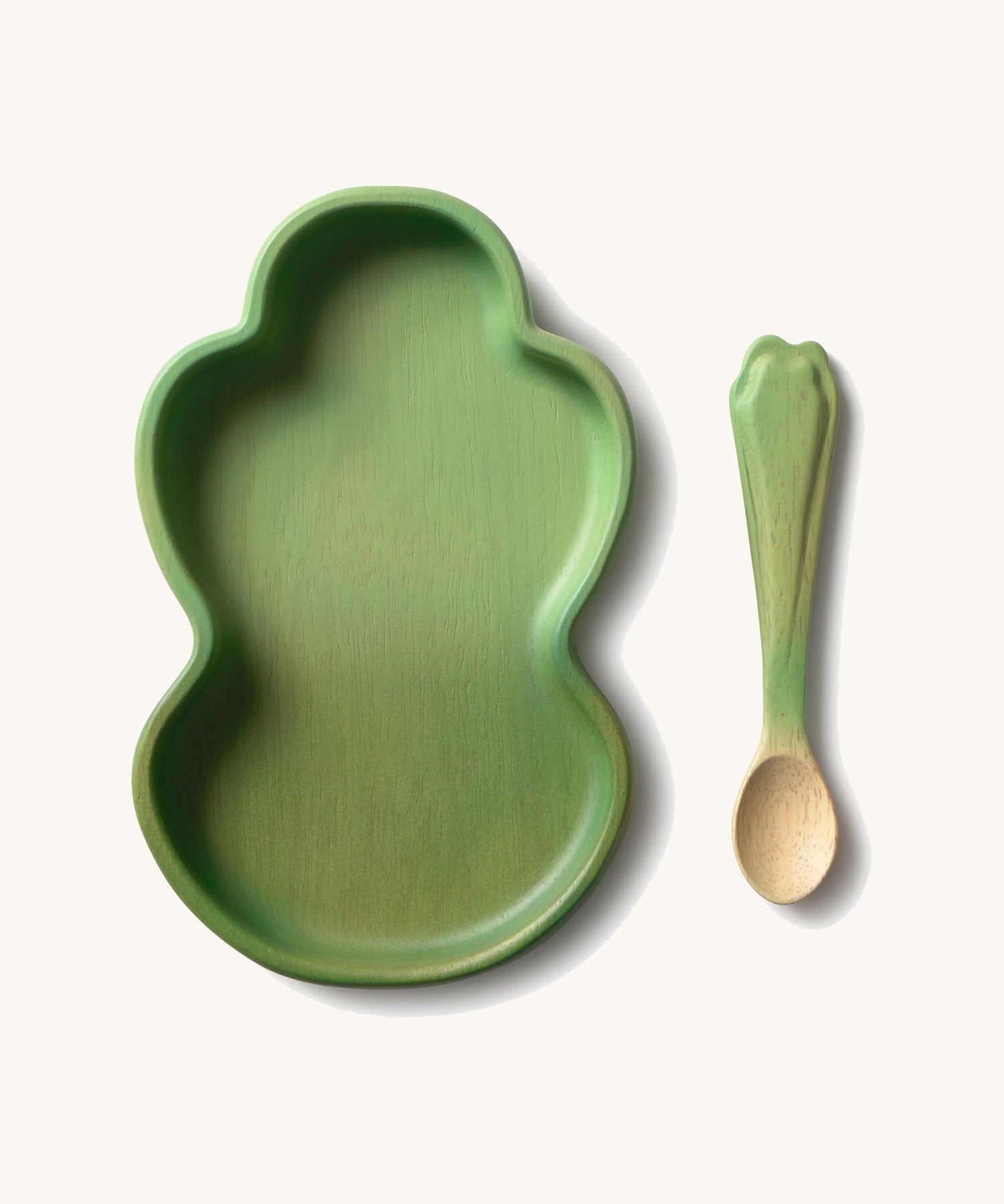 Oli & Carol Kendall the kale wooden plate and spoon set available at Babipur. Plate is in a shape of a piece of kale
