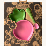 A close up of the cardboard packaging holding the Oli & Carol Ramona the radish wooden plate and spoon set available at Babipur. 