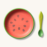 Oli & Carol Wally the watermelon wooden plate and spoon set available at Babipur. Plate is in a shape of a watermelon cut in half.