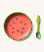 Oli & Carol Wally the watermelon wooden plate and spoon set available at Babipur. Plate is in a shape of a watermelon cut in half.