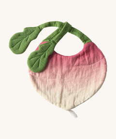 Oli & Carol Ramona the radish baby bib available at Babipur. A organic cotton bib in a shape of a radish. Features a popper fastener. 