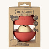 The front of the cardboard packaging holding the Oli & Carol red apple stacking toy rattle ball available at Babipur. 