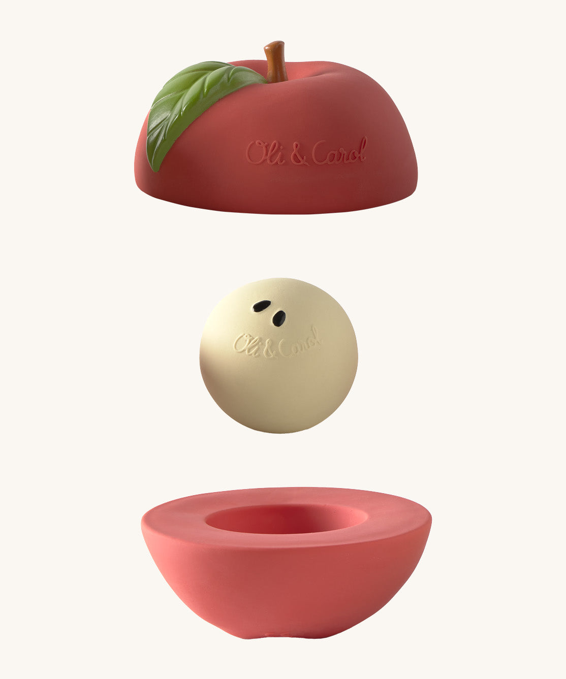 Oli & Carol red apple stacking toy rattle ball available at Babipur. Showing the 2 halves with the core. 