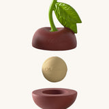 Oli & Carol cherry stacking toy rattle ball available at Babipur. Showing the 2 halves with the core. 