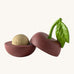 A opened Oli & Carol cherry stacking toy rattle ball available at Babipur. Showing the 2 halves with the core. 