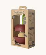 The side of the cardboard packaging holding the Oli & Carol cherry stacking toy rattle ball available at Babipur. 