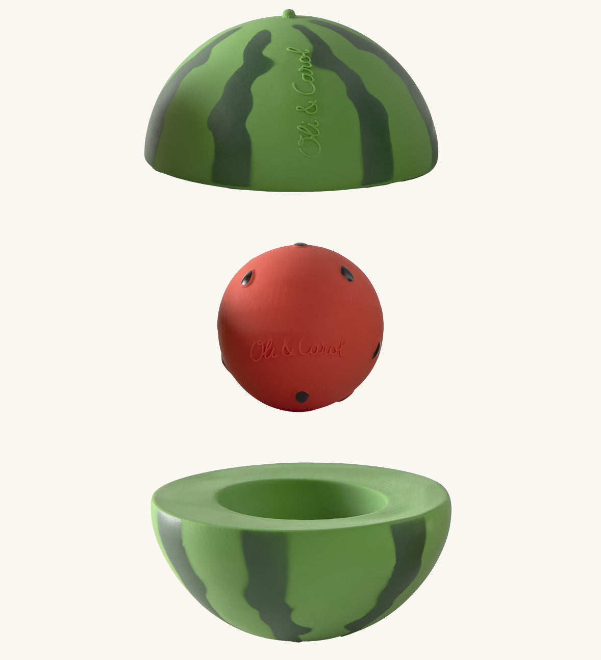 Oli & Carol watermelon stacking toy rattle ball available at Babipur. Showing the 2 halves with the core. 