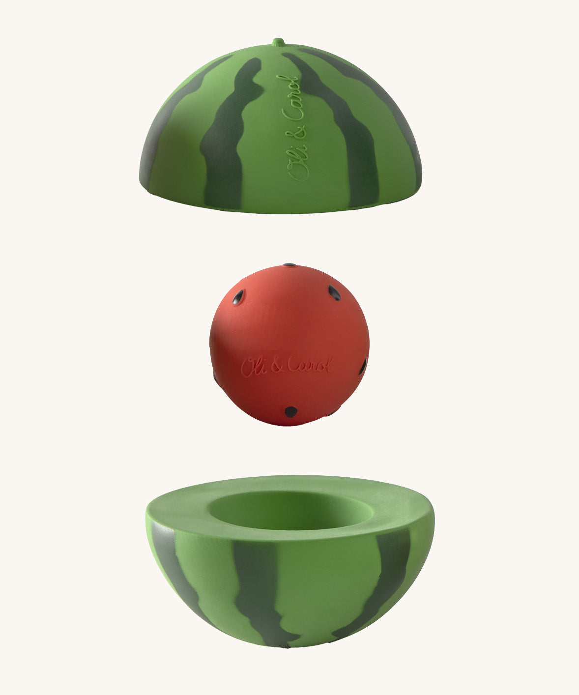 Oli & Carol watermelon stacking toy rattle ball available at Babipur. Showing the 2 halves with the core. 