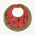Oli & Carol Wally the watermelon baby bib available at Babipur. A organic cotton bib in a shape of a watermelon cut in half. Features a popper fastener. 