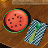 Oli & Carol Wally the watermelon wooden plate and spoon on a table set available at Babipur. 