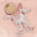 Olli Ella Aurora fairy dozy dinkum doll lying on a soft pink surface. 