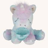 The Olli Ella binky baby unicorn dinkum available at Babipur. A soft and cuddly doll in light pastel colours. Features a white  unicorn horn with a blue magnetic pacifier