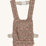 Olli Ella Dinkum Dolls Carrier - Garland is a soft body, cotton carrier with a beautiful vintage floral print. The carrier come with adjustable straps and can be worn on the front or the back. The image is on a cream background