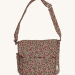 The Olli Ella Carrie Convertible Changing Set in Garland, which is a beautiful, vintage floral print on a cream background